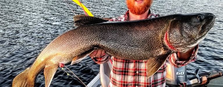 Windsor with an aikens lake trout caught on one of his evenings off